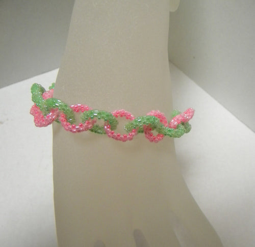 Petite beadweaved pink and green bracelet